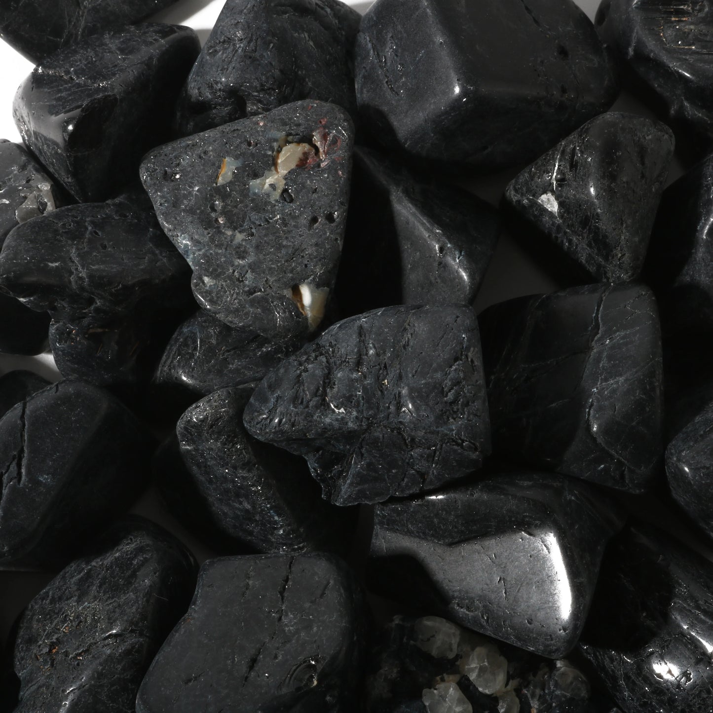 Black tourmaline tumbled stones for spiritual protection and grounding negative energy