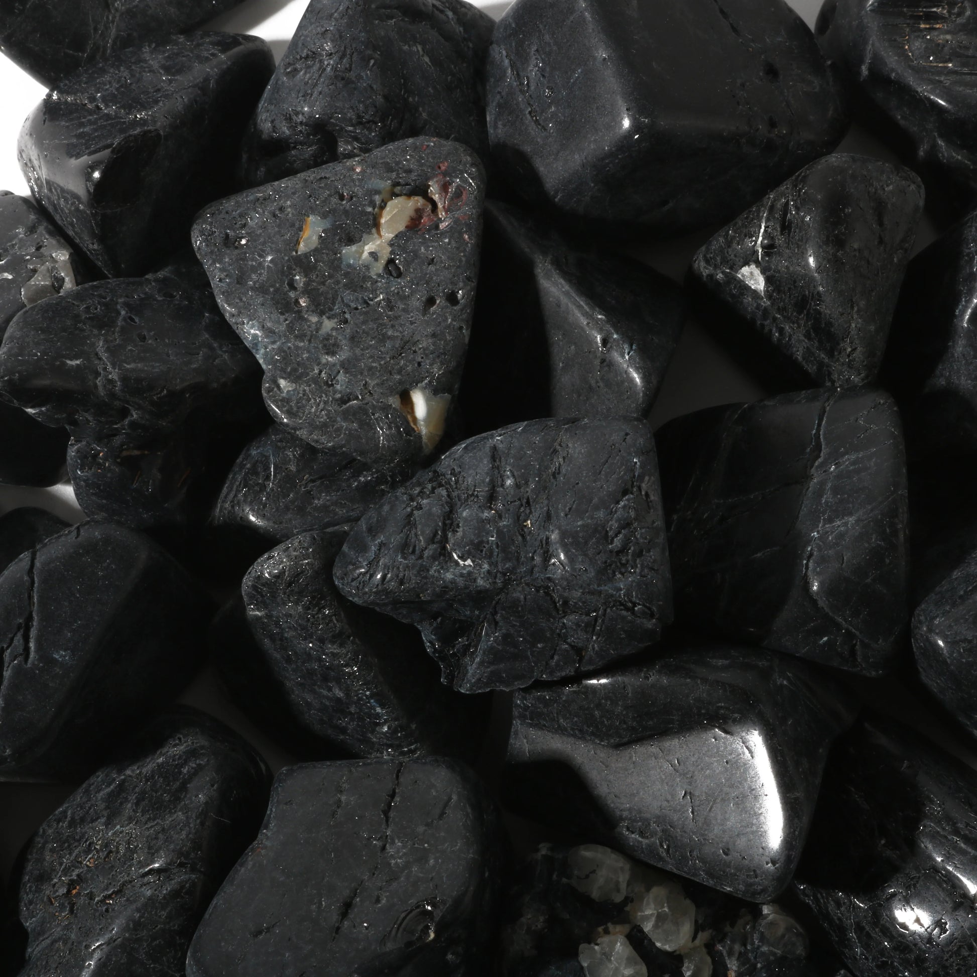 Black tourmaline tumbled stones for spiritual protection and grounding negative energy