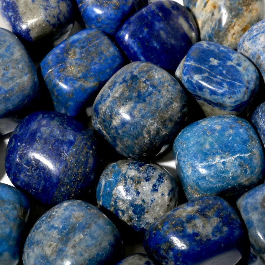 Deep blue lapis lazuli crystals for throat chakra healing and wisdom enhancement