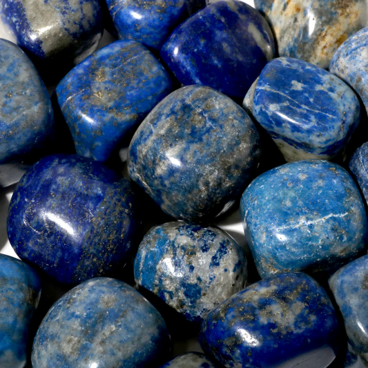 Deep blue lapis lazuli crystals for throat chakra healing and wisdom enhancement