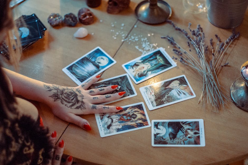 Tarot cards spread on table with crystals - divination and self-discovery