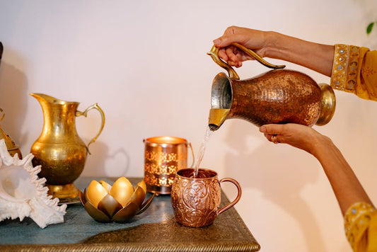 Water pouring from pitcher - ritual washing and spiritual purification