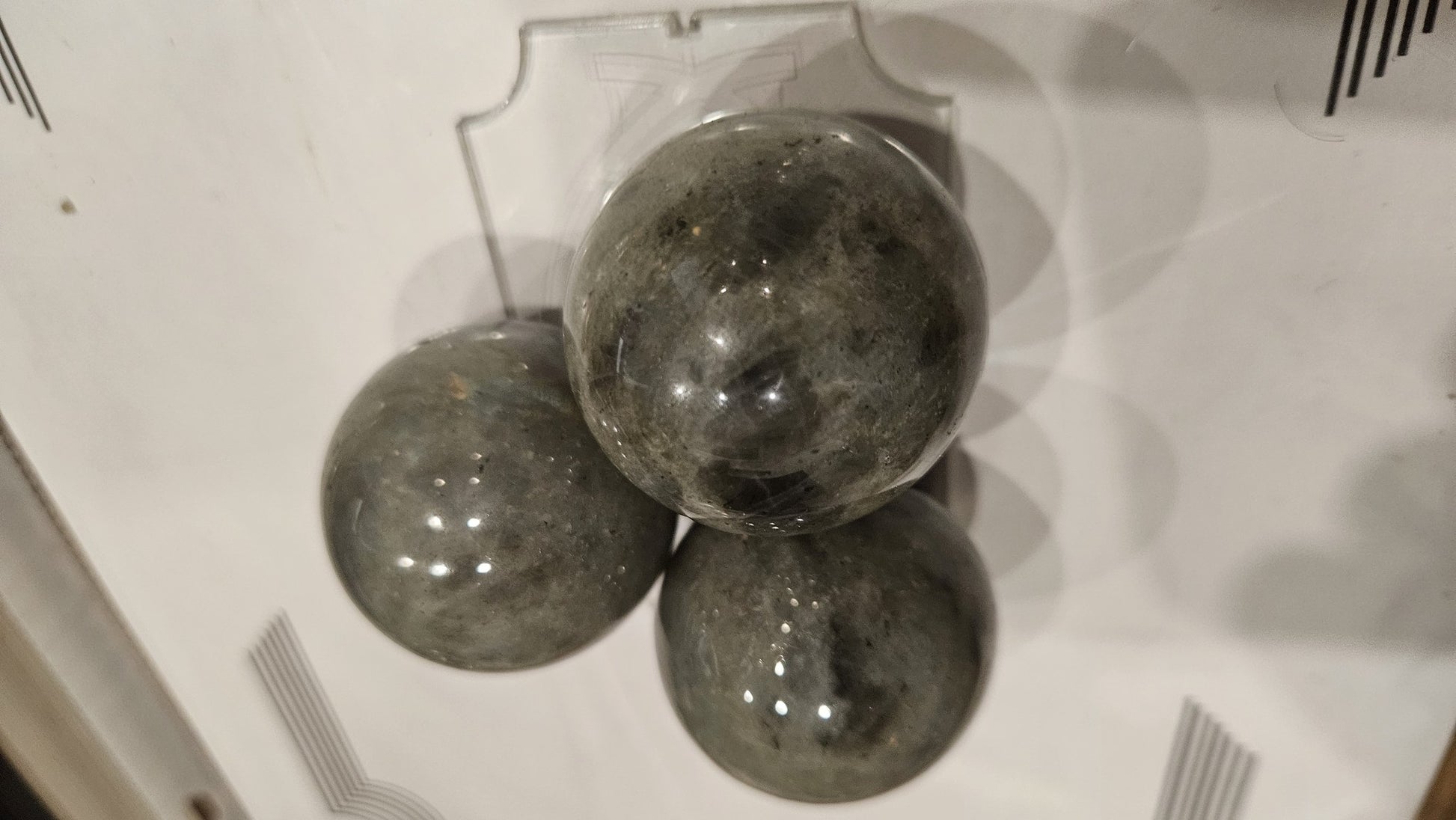 Labradorite spheres 40mm detail view stacked with flash visible