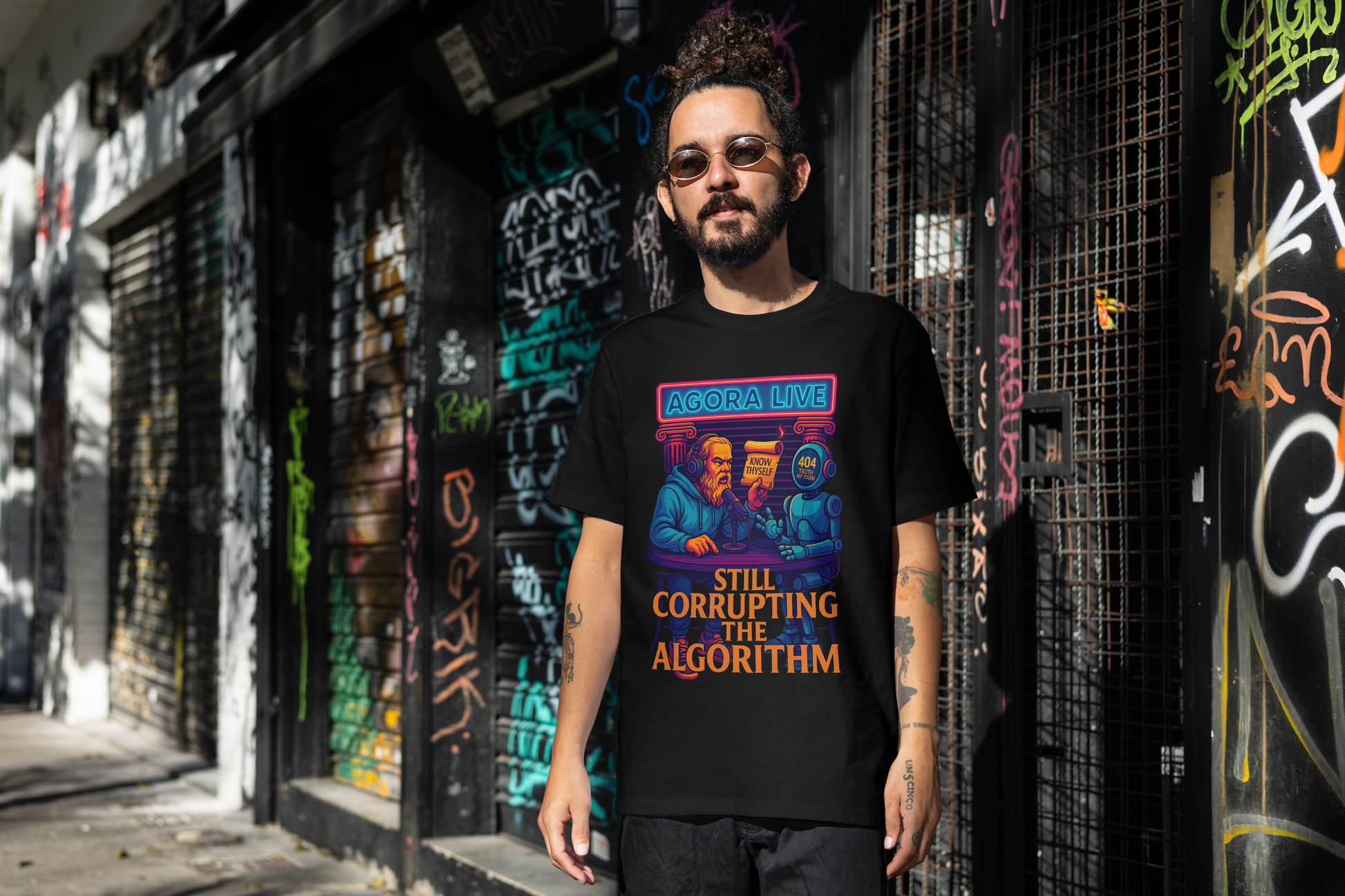 Man wearing socrates agora live philosophy tshirt at thalira
